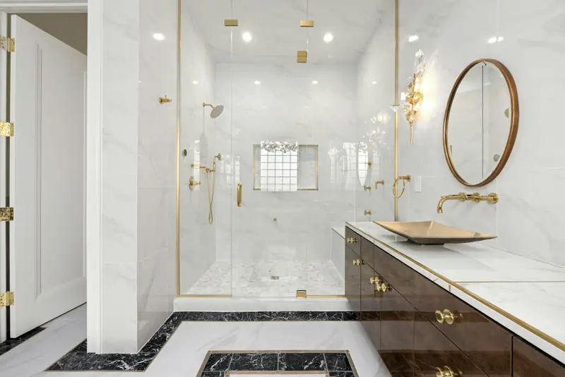 White marble bathroom with gold fittings